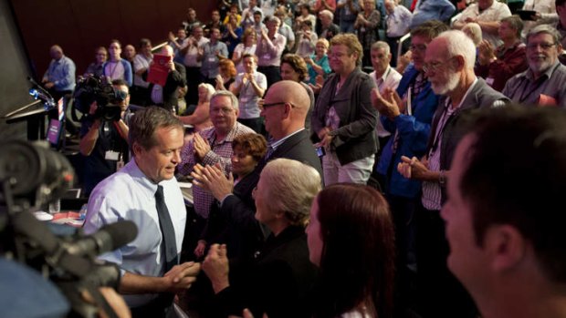 Federal opposition leader Bill Shorten greets Labor party faithful after speaking at the Queensland Labor Party state conference held at QUT.