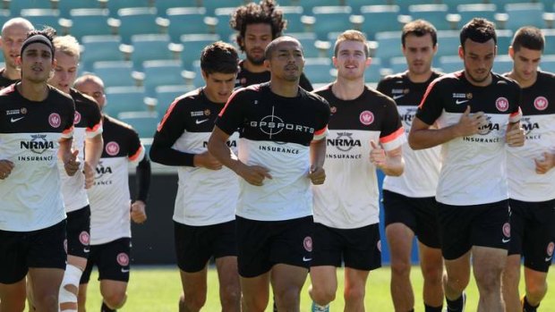 Big in Australia: Marquee man Shinji Ono (centre) leads the way at Wanderers training on Thursday.
