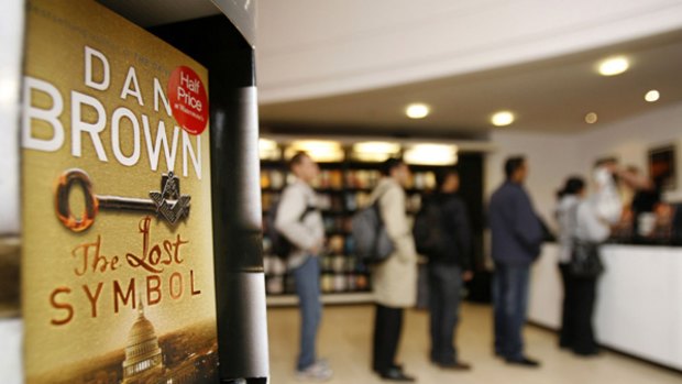People queue to buy a signed copy of the new Dan Brown novel "The Lost Symbol" at a bookshop in London.