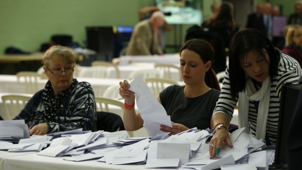 Ballots sorted and counted in Britain's general election. 