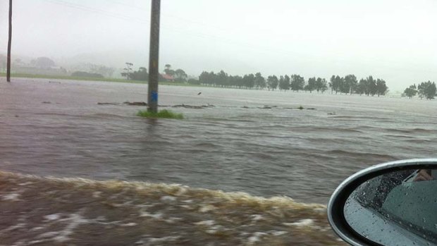 "Like a river" ... Elly Kimberley took this picture from her stranded car on the Princes Highway outside Berry this afternoon.