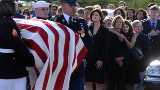 (Left to right) Victoria Reggie Kennedy, Kara Kennedy, Grace Kennedy Allen, Teddy Kennedy III and Patrick Kennedy watch the coffin of US Senator Edward M. Kennedy as it is carried into the John F. Kennedy Presidential Library and Museum in Boston, Massachusetts.