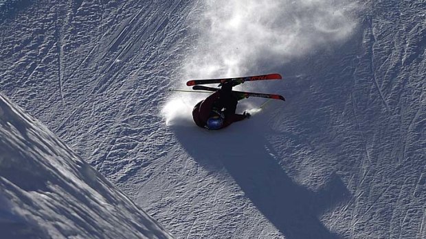 Russ Henshaw falls during the men's ski slopestyle final on Sunday.