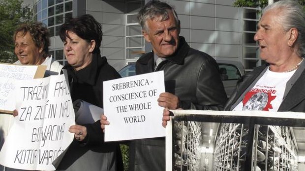 Relatives of Bosnian war dead protest outside the war crimes tribunal.