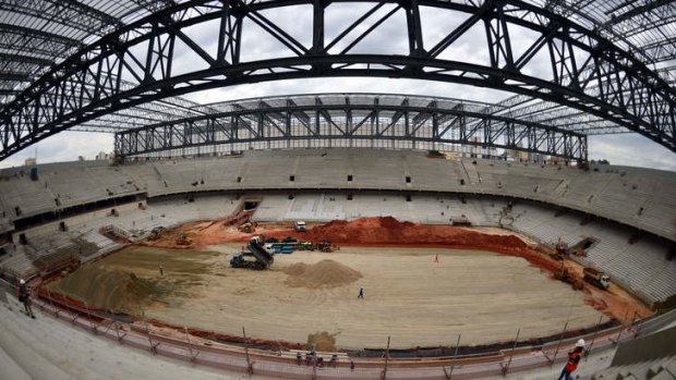 Progressing: Curitiba's Arena da Baixada stadium is still under construction, but officials are confident the stadium will be ready in time for the World Cup.