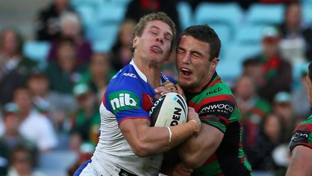 Impact ... Knights Kyle O'Donell gets knocked out by a shoulder charge from Souths Sam Burgess.
