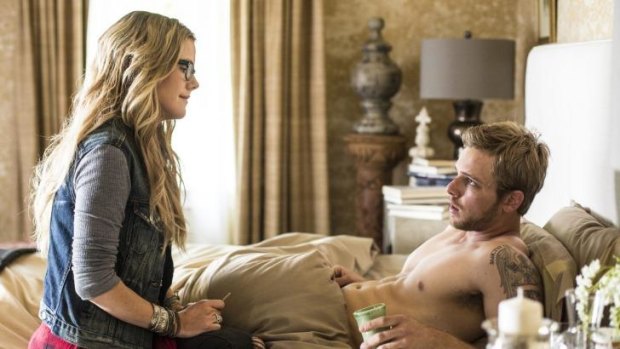 Open for business: Kathleen Robertson as Jodi Morgan and Max Thieriot as Dylan Massett in Bates Motel.