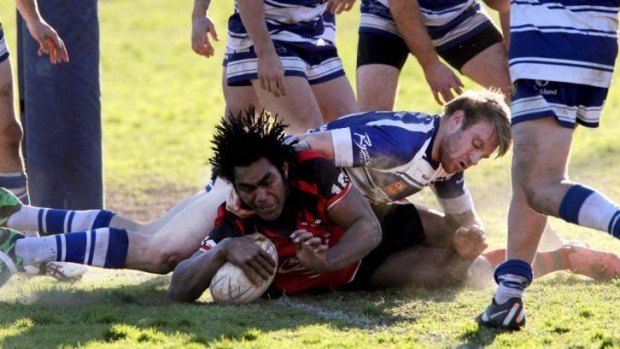 A real tryer: Fijian forward Peni Botiki scores a try for Collegians during his time in the Illawarra local competition.
