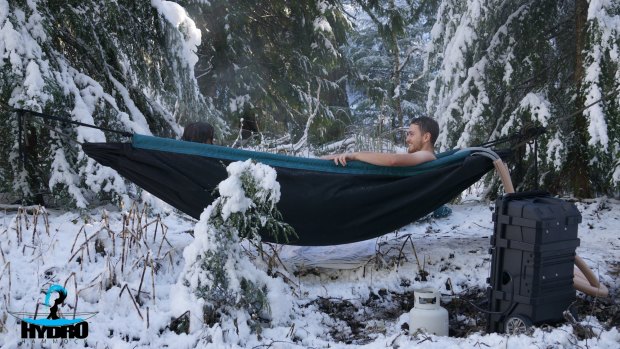 The Hydro Hammock being used as a suspended hot tub.