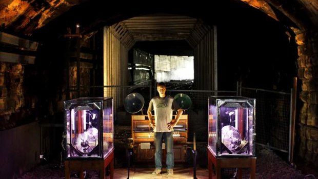 Cabinet minister: Artist Ian Burns with his work <i>Extended Stage</i>, which takes place in the old Ultimo tunnel.