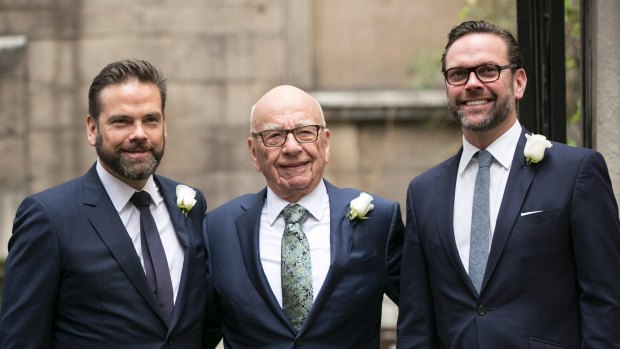 James Murdoch (right), with brother Lachland and father Rupert, will join Tesla's board.