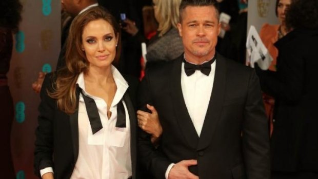 Dive each other 'beautifully crazy': Angelina Jolie and Brad Pitt in February.