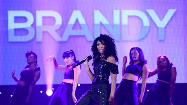 R&B star Brandy performs at a previous, more popular concert.