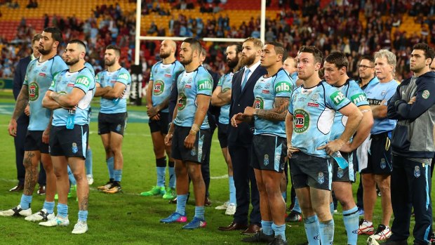 Cursed: The vanquished NSW side has that familiar July look about them. 