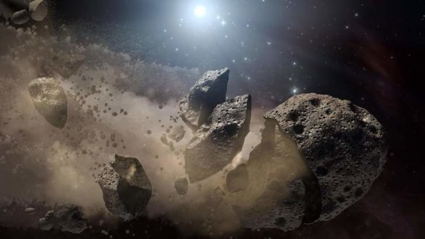 Image courtesy of NASA shows an artist's concept of a broken-up asteroid.