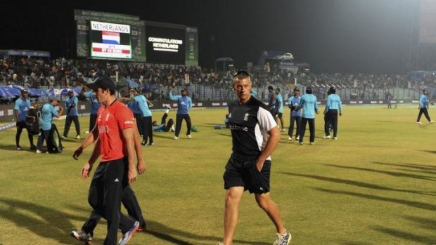 Coach Ashley Giles trudges off after England's humiliating loss to the Netherlands.