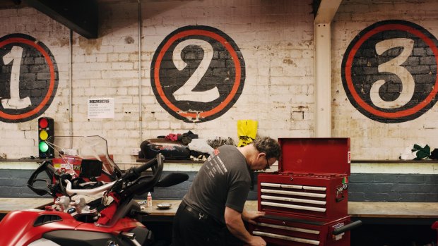 Sydney's first communal motorcycle workshop that provides space, tools, storage and expert advice for members to work on their motorcycles. Peter Whitfield chooses tools to work on his BMW GS.