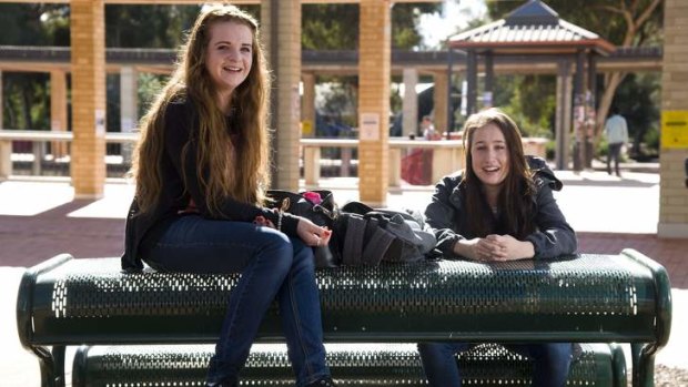CHANGE ''INEVITABLE'': University of Canberra students Erin Davis, 19, and Nicole Semmler, 20. Ms Davis says the higher fees will turn people away from tertiary education.