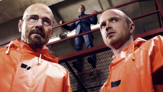 Chemistry: Walt (Bryan Cranston) and Jesse (Aaron Paul) watched by drug boss Gus (Giancarlo Esposito).