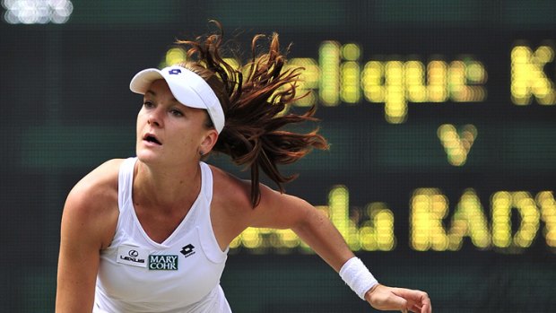 Poland's Agnieszka Radwanska serves during her straight-sets semi-final victory over Germany's Angelique Kerber.