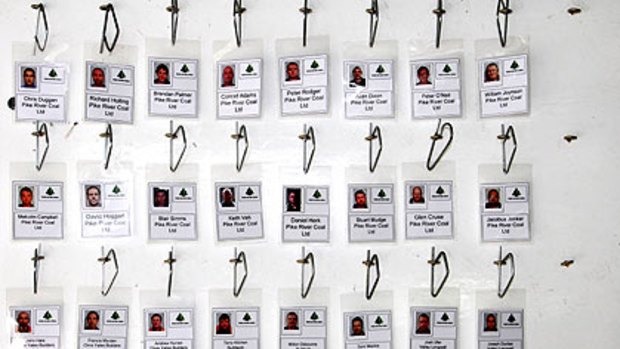 Name tags of the 29 miners hang unclaimed in Greymouth.