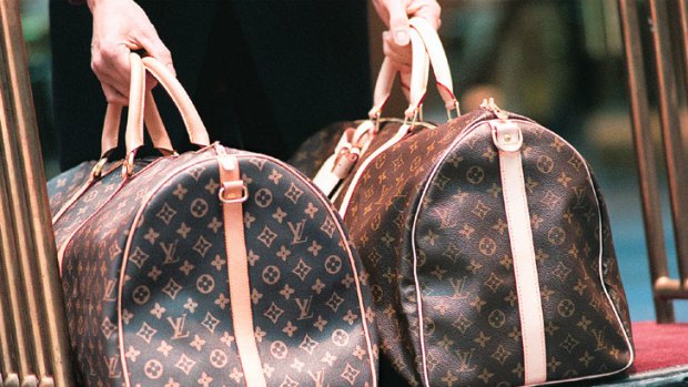Louis Vuitton bags ... the fake is on the left. China is planning to wipe out its fake goods being produced.