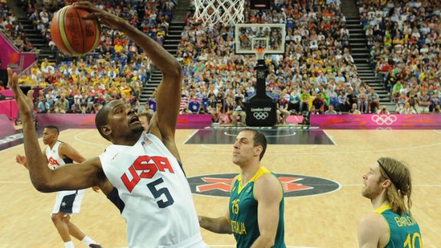 Kevin Durant ... jumps for the ball during his team's match against Australia.