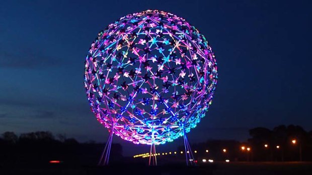 Rolling on: An artist's impression of Sydney's celebratory mirror ball sculpture that will find a new home in New Zealand.