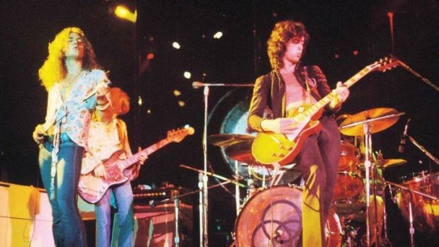 Robert Plant, John Paul Jones and Jimmy Page in an undated Led Zeppelin concert photo.