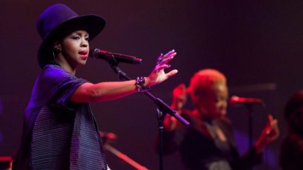 Lauryn Hill gestures to the crowd during her Vivid Live gig at the Sydney Opera House on Tuesday night.
