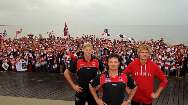Coach Scott Watters, Nick Riewoldt and Sam Gilbert at  the St Kilda membership ad campaign yesterday.