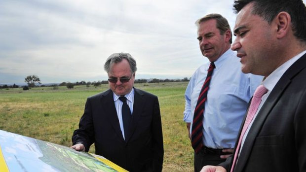 Village Building Company director Bob Winnel, Queanbeyan Mayor Tim Overall  and NSW MP John Barilaro on site at Tralee.