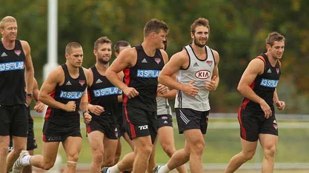 Essendon trains for the pre-season tournament. Club captains are now asking for the training period to be reduced.