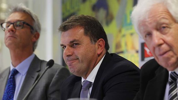 New Socceroos coach Ange Postecoglou with FFA chairman Frank Lowy and CEO David Gallop.