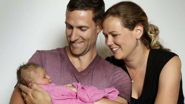 ONE IN A HUNDRED: Hugh and Natalie Ekin-Smyth hold Annabel Grace, who was born a minute into the centenary year.