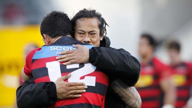 Tana Umaga of Counties Manukau hugs Sonny Bill Williams of Canterbury after their round 12 ITM Cup match.