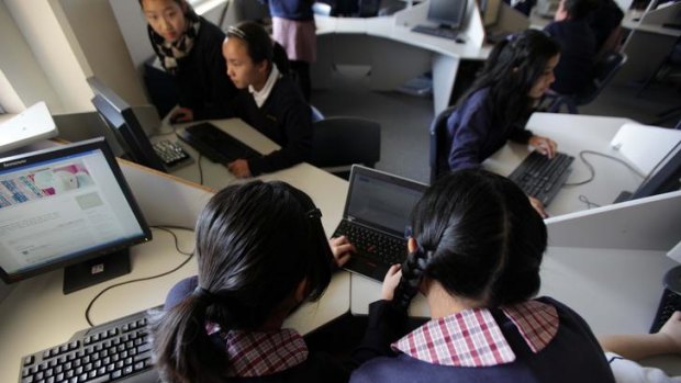 Students from years 7, 8 and 9 update their blogs at Birrong Girls High School.