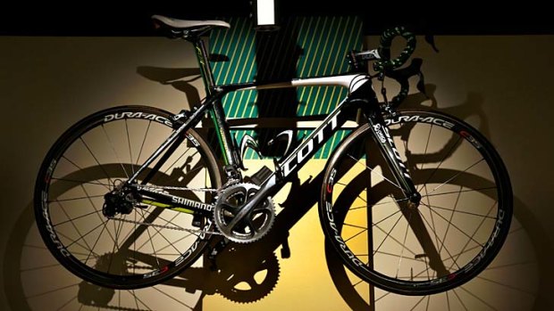 Tarnished memento: Stuart O'Grady's 2012 team bike hangs at the National Sports Museum as part of the exhibition on how green and gold became Australia's national sporting colours.