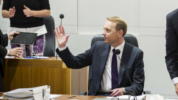 Simon Corbell acknowledges a standing ovation from the public gallery after introducing the Marriage Equality Bill in the ACT Legislative of Assembly in September.
