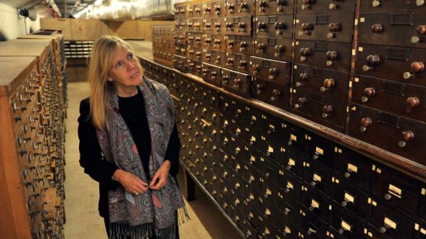 Victoria Thornton, of Open House Worldwide, tours the State Library's catacombs, which will be open to the public this weekend.