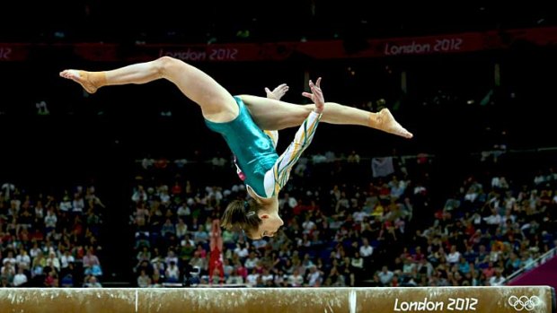 Lauren Mitchell during her routine on the beam in teams qualifying at the London Olympics.
