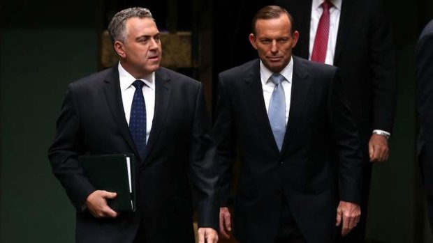 Treasurer Joe Hockey and Prime Minister Tony Abbott. Mr Abbott has wrongly claimed that former PM John Howard took a big hit in the polls after delivering a tough first budget in 1996.