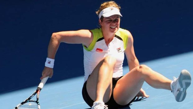 Despite an ankle injury Clijsters fought through a tough three sets to defeat Li Na of China.