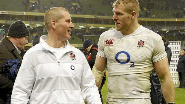 England's head coach Stuart Lancaster with James Haskell after defeating Ireland in Dublin.
