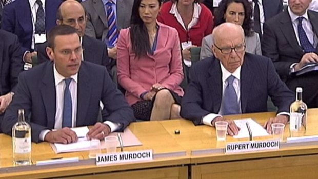 BSkyB Chairman James Murdoch, News Corp Chief Executive and Chairman Rupert Murdoch (right) appear before a parliamentary committee on phone hacking.