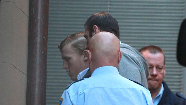 Matthew Milat, left, arrives at the NSW Supreme Court this morning before being sentenced to 43 years in jail for murder.