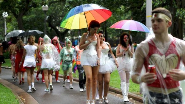 2012: Participants enjoyed the Mardi Gras parade despite the wet weather.