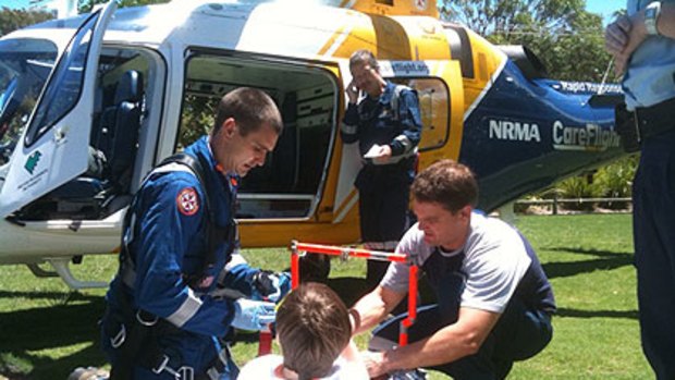 Harry Keighery about to be flown to hospital for surgery after the accident.