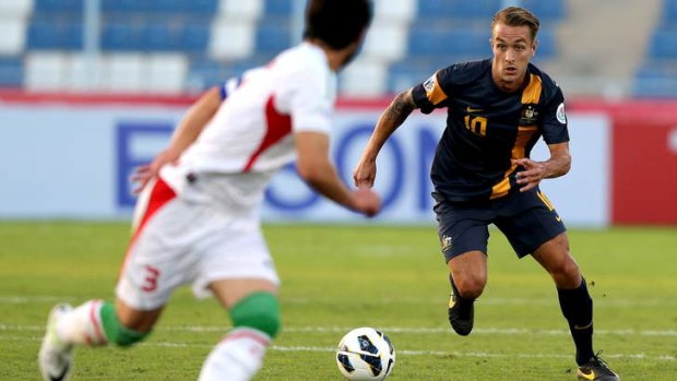 Valuable: Adam Taggart logs another international match for the under-22s against Iran.