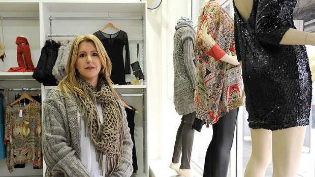 Tina Savva had to close her childrenswear store and reopen as a ladies' boutique.